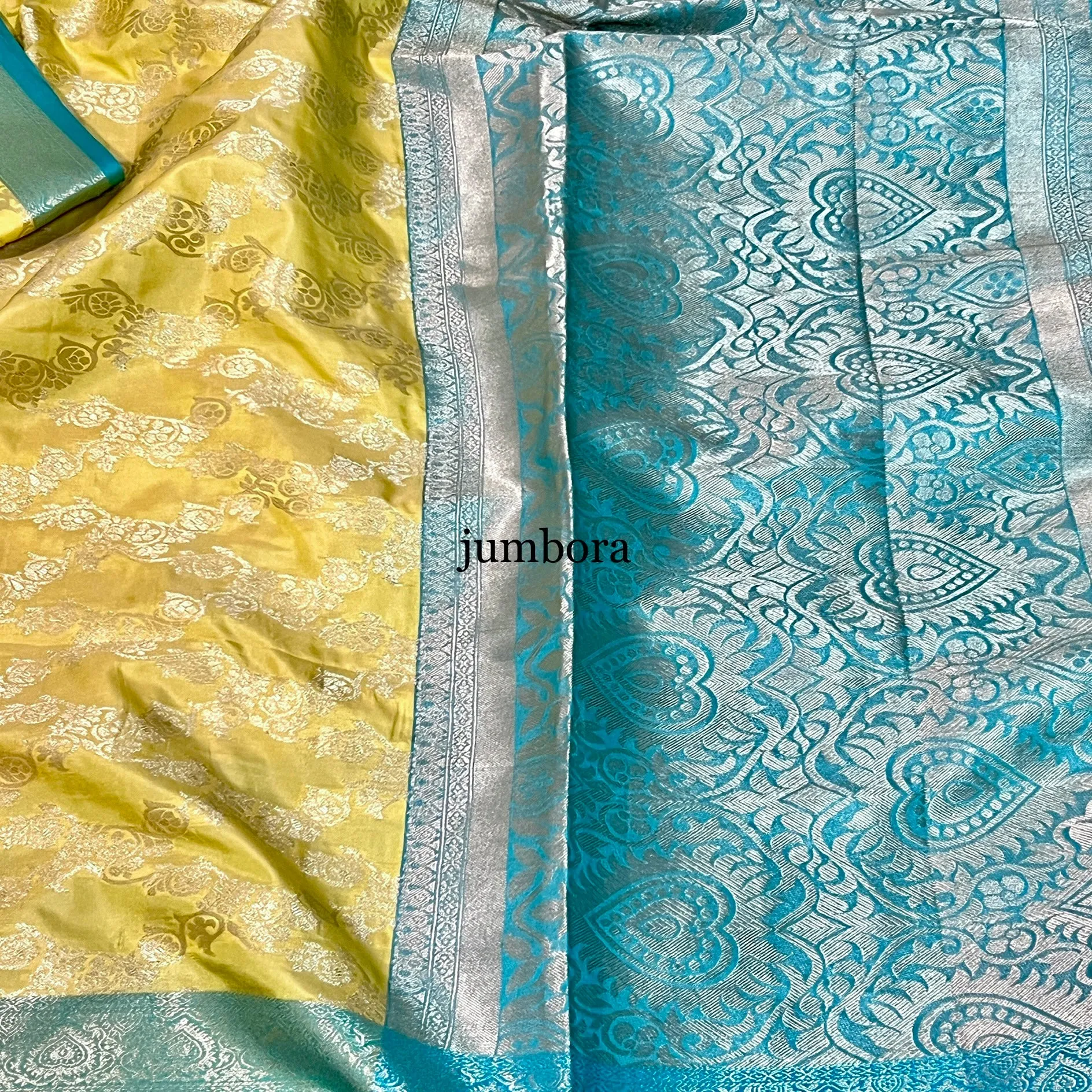 Pastel Yellow & Sea Green Jangla Banarasi Silk Saree with stitched Blouse
